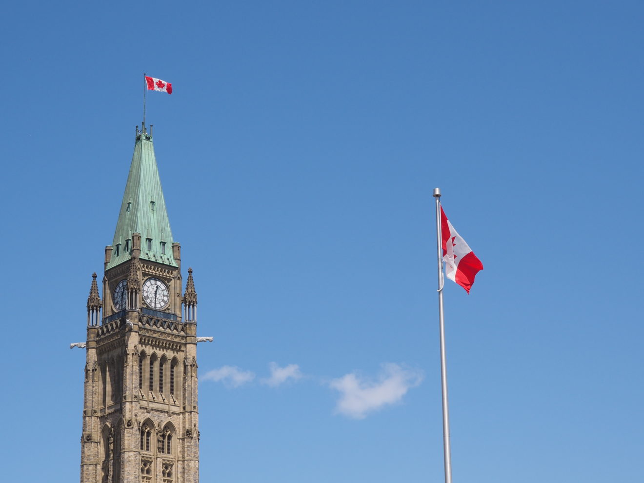 Ottawa parliament and Canadian flag